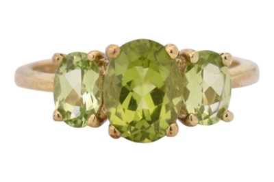 Lot 349 - HALLMARKED 9CT GOLD PERIDOT THREE STONE RING