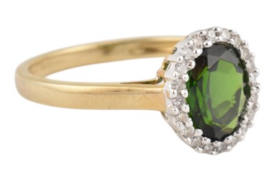 Lot 59 - HALLMARKED 9CT GOLD TOURMALINE & DIAMOND HALO RING