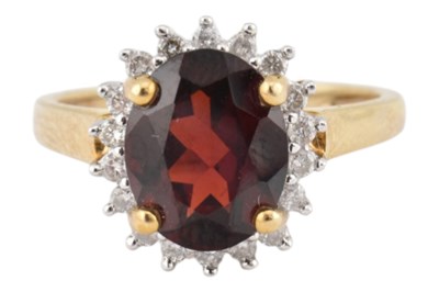 Lot 468 - HALLMARKED 9CT GOLD & GARNET HALO RING