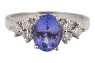 Lot 334 - HALLMARKED 18CT GOLD TANZANITE & DIAMOND RING