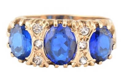 Lot 340 - HALLMARKED 9CT GOLD THREE STONE RING