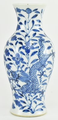 Lot 2 - QING DYNASTY BLUE AND WHITE VASE WITH DRAGON 清 青花龙穿牡丹小瓶