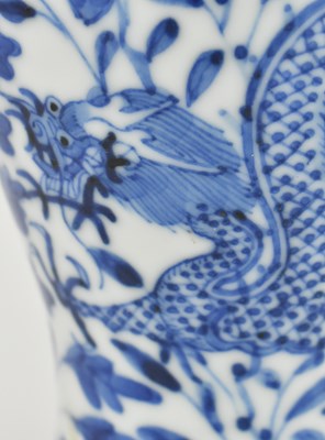 Lot 2 - QING DYNASTY BLUE AND WHITE VASE WITH DRAGON 清 青花龙穿牡丹小瓶