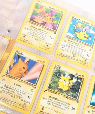 Lot 516 - POKEMON - 2000 COMPLETE PIKACHU WORLD COLLECTION TRADING CARDS