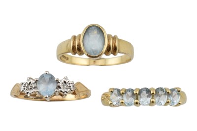 Lot 126 - THREE HALLMARKED 9CT GOLD & AQUAMARINE RINGS