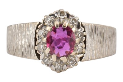 Lot 35 - 18CT GOLD RUBY & DIAMOND CLUSTER RING