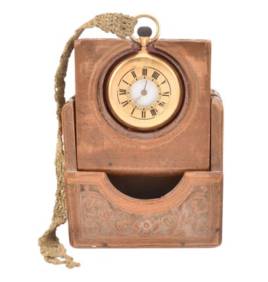 Lot 245 - A 18CT GOLD FOB POCKET WATCH IN CARVED WOODEN CASE / STAND