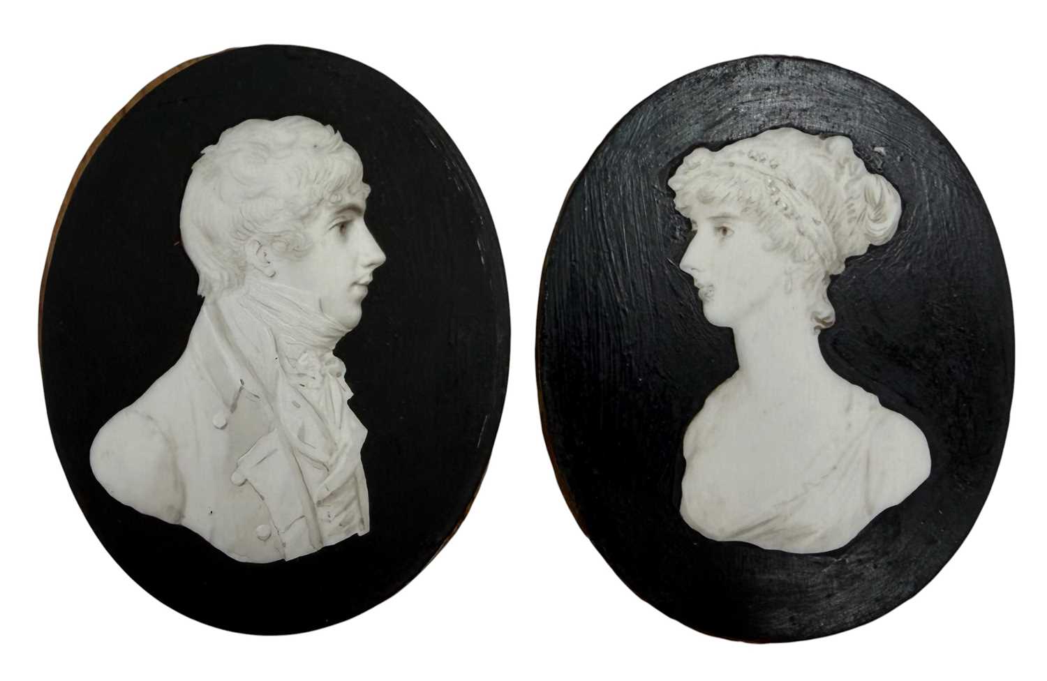 Lot 22 - PAIR OF 19TH CENTURY WATERCOLOUR ON IVORY MINIATURE PORTRAITS OF HUSBAND & WIFE