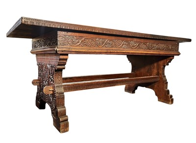 Lot 313 - RENAISSANCE INSPIRED 19TH CENTURY CARVED WALNUT & ELM REFECTORY TABLE