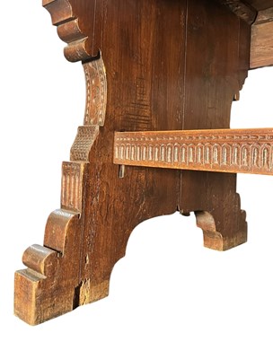 Lot 313 - RENAISSANCE INSPIRED 19TH CENTURY CARVED WALNUT & ELM REFECTORY TABLE