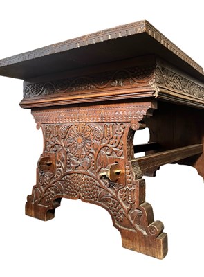 Lot 313 - RENAISSANCE INSPIRED 19TH CENTURY CARVED WALNUT & ELM REFECTORY TABLE