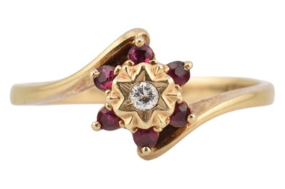 Lot 266 - HALLMARKED 9CT GOLD RUBY & DIAMOND BYPASS RING