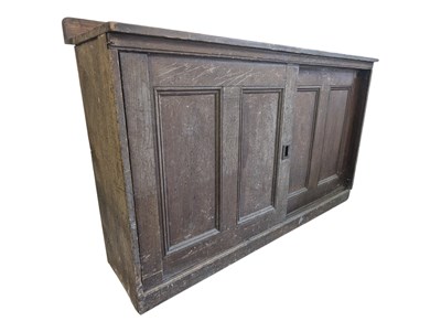 Lot 693 - VICTORIAN 19TH CENTURY OAK TWIN DOOR SCHOOL CUPBOARD - SIDEBOARD