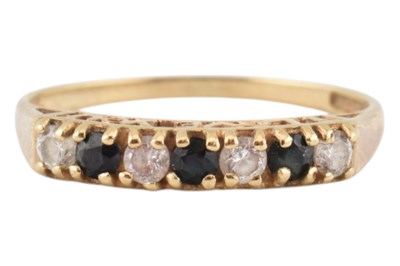 Lot 234 - HALLMARKED 9CT GOLD SAPPHIRE & CZ SEVEN STONE RING