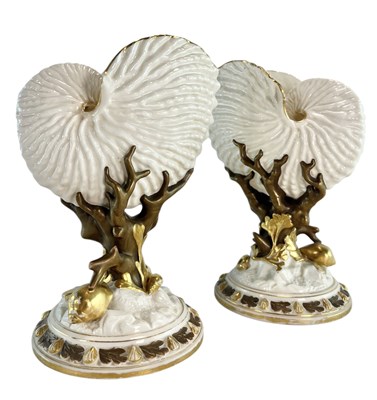 Lot 14 - PAIR OF EARLY 20TH CENTURY ROYAL WORCESTER IVORY PORCELAIN NAUTILUS CENTREPIECES