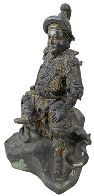 Lot 40 - QING CAST BRONZE FIGURE OF DEITY OF TAOISM 清 真武大帝铜(?)坐像