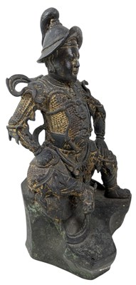 Lot 40 - QING CAST BRONZE FIGURE OF DEITY OF TAOISM 清 真武大帝铜(?)坐像