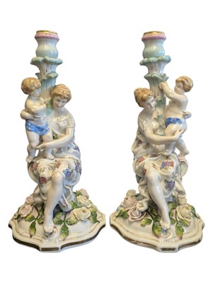 Lot 124 - A PAIR OF 19TH CENTURY MANNER OF MEISSEN CONTINENTAL PORCELAIN FIGURAL CANDLESTICKS