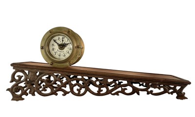 Lot 60 - 10 JEWEL 'ROLLING DRUM' CLOCK ON CARVED WOODEN STAND