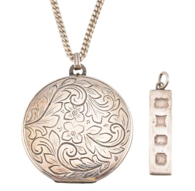 Lot 232 - A HALLMARKED SILVER LOCKET & HALLMARKED SILVER INGOT PENDANT