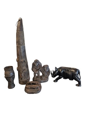 Lot 478 - FIVE AFRICAN WOODEN SCULPTURES - TO INCLUDE A MONKEY, A RHINO AND DECORATIVE HORN ETC