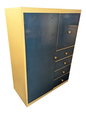 Lot 557 - BRITISH MODERN DESIGN - MID CENTURY TWO TONE 1950S CUPBOARD