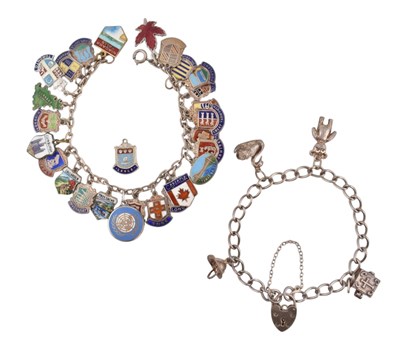 Lot 253 - TWO VINTAGE SILVER CHARM BRACELETS