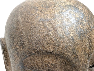 Lot 18 - CHINESE CARVED LIMESTONE HEAD OF A LUOHAN / ARHAT 石刻罗汉头像