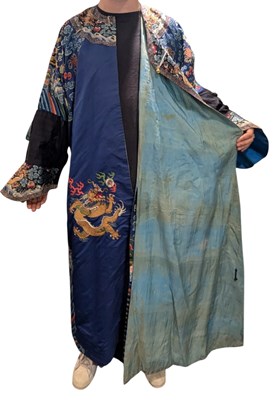 Lot 100 - LATE 19TH CENTURY / EARLY 20TH CENTURY CHINESE WOVEN SILK 'DRAGON' ROBE 清 藍地五爪金龍紋龙袍
