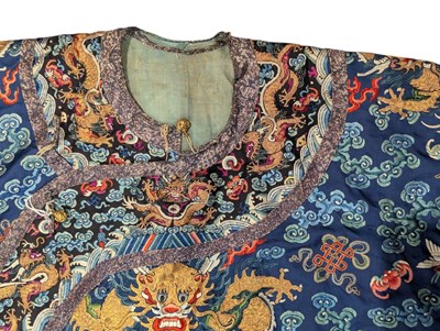 Lot 100 - LATE 19TH CENTURY / EARLY 20TH CENTURY CHINESE WOVEN SILK 'DRAGON' ROBE 清 藍地五爪金龍紋龙袍