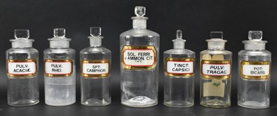 Lot 127 - SEVEN VINTAGE 20TH CENTURY GLASS APOTHECARY / CHEMISTS BOTTLES WITH LABELS