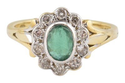 Lot 174 - HALLMARKED 18CT GOLD EMERALD & DIAMOND HALO RING