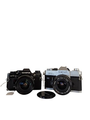 Lot 446 - TWO 35MM FILM CAMERAS - OLYMPUS OM10 - CANON FTB