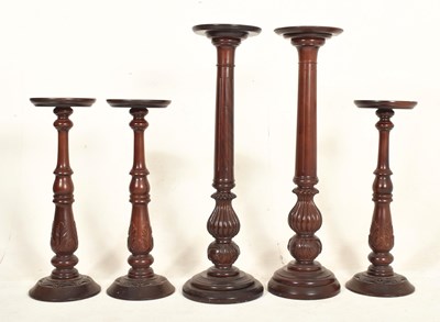 Lot 438 - FIVE CONTEMPORARY HIGH END DESIGN CARVED WOOD FLOOR COLUMN STANDS