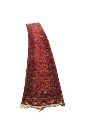 Lot 823 - EARLY 20TH CENTURY WOVEN BOKHARA RUNNER RUG