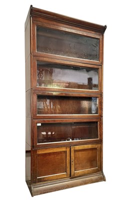Lot 536 - MANNER OF GLOBE WERNICKE - EARLY 20TH CENTURY OAK LAWYERS FIVE-TIER BOOKCASE