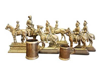 Lot 238 - 20TH CENTURY BRASS COATED IRON DOOR STOPS & TWO DRINKING TANKARDS