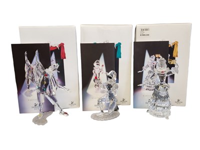Lot 93 - SWAROVSKI - 1999 TO 2001 MASQUERADE SERIES SET OF THREE CRYSTAL FIGURES