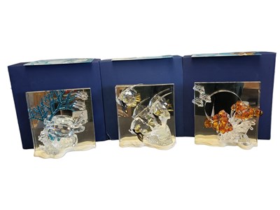 Lot 94 - SWAROVSKI - 21ST CENTURY WONDERS OF THE SEA SET OF THREE CRYSTAL GLASS FIGURES