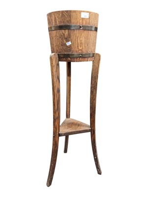 Lot 881 - LISTER OF DURSLEY - EARLY 20TH CENTURY COOPERED OAK PLANT STAND / PLANTER