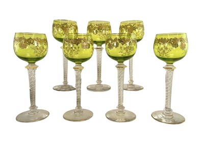 Lot 47 - MANNER OF CRISTALLERIES SAINT LOUIS - 7 GREEN GLASS & AIR TWIST STEM GLASSES