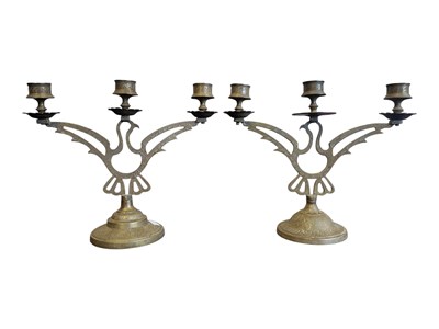 Lot 330 - A PAIR OF 20TH CENTURY VINTAGE BRASS ENGRAVED CANDLESTICKS