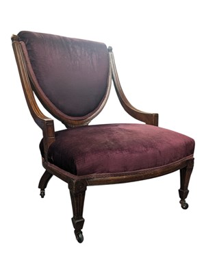 Lot 737 - LATE 19TH CENTURY AESTHETIC FIRESIDE CHAIR