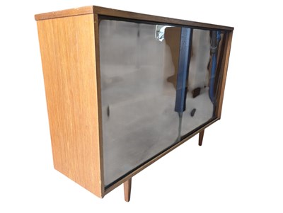 Lot 656 - BRITISH MODERN DESIGN - MID CENTURY LOW TEAK BOOKCASE