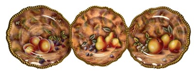 Lot 25 - THREE DAVID BOWKETT, EX WORCESTER, HAND PAINTED PORCELAIN FRUIT PLATES