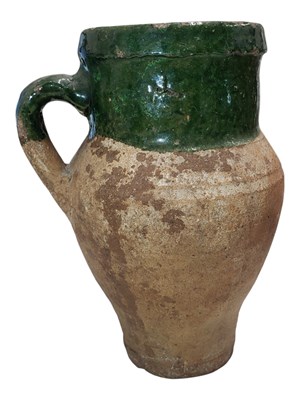 Lot 174 - BELIEVED 16TH CENTURY CONTINENTAL LEAD GLAZED EARTHENWARE JUG