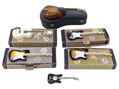 Lot 240 - FENDER - COLLECTION OF ELECTRIC MINIATURE GUITAR MODELS