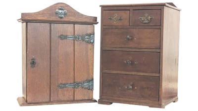 Lot 689 - TWO EARLY 20TH CENTURY TABLE CHEST OF DRAWERS & CABINET