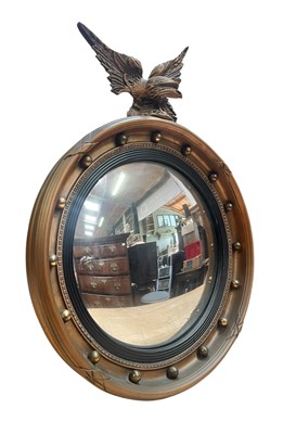 Lot 604 - REGENCY REVIVAL EAGLE CONVEX WALL MIRROR