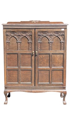 Lot 993 - A GOTHIC REVIVAL LATE 20TH CENTURY WINE / BOTTLE CABINET
